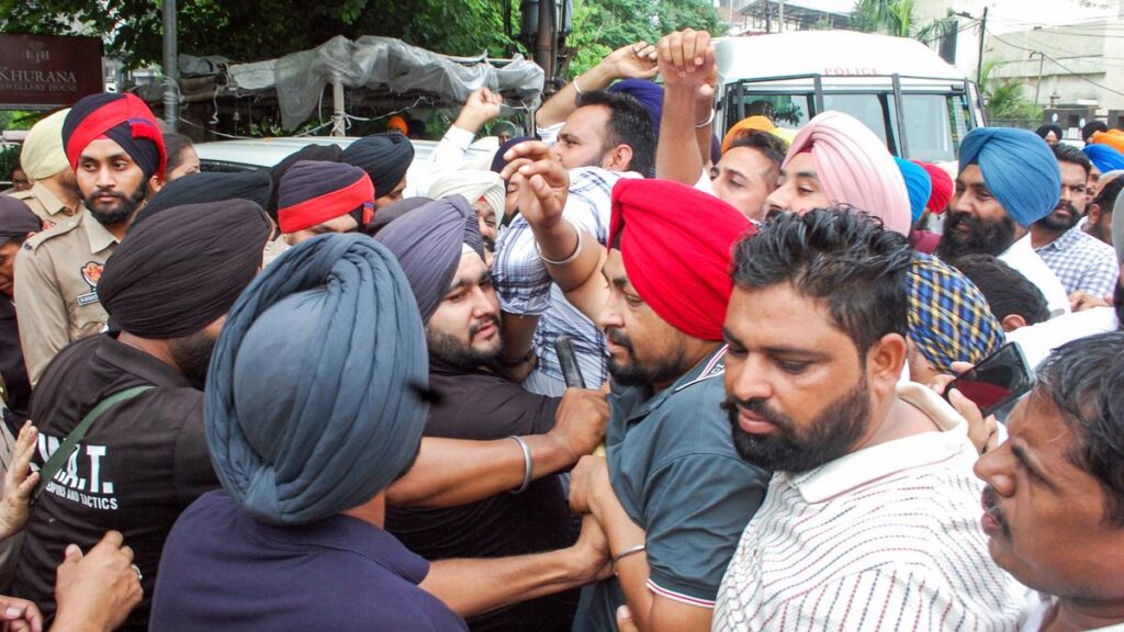 SAD workers hold protest over arrest of party leader Bikram Maijithia