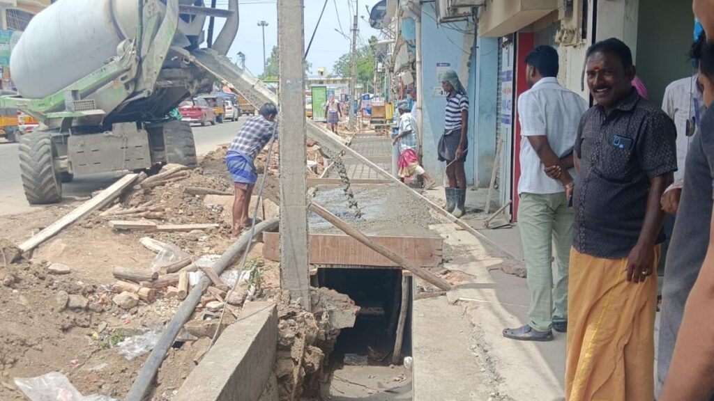 Residents upset over drains being constructed without removing electric poles