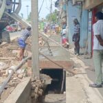 Residents upset over drains being constructed without removing electric poles