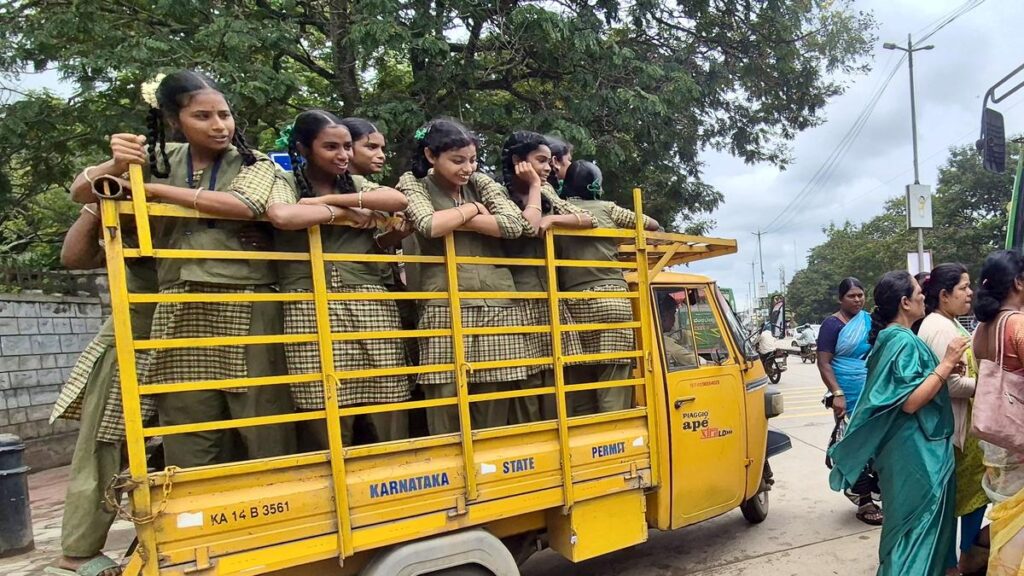 Girl students travel in goods-carrying vehicle to attend government programme in Karnataka’s Shivamogga dist.