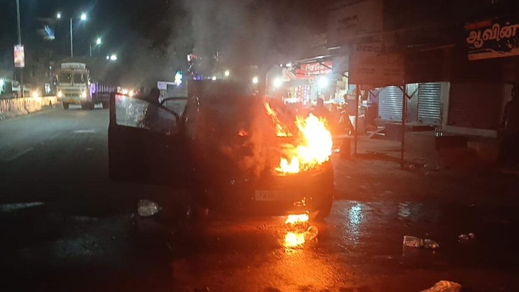 Man escapes unhurt after car catches fire near Ambur